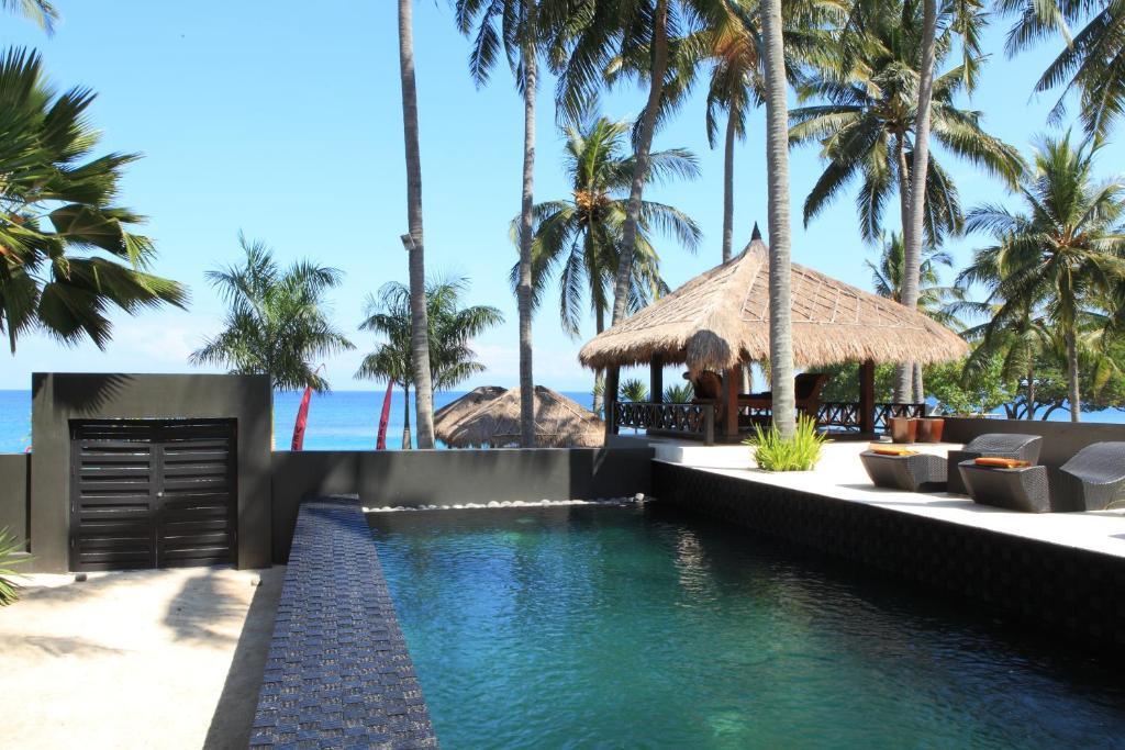 Qunci Villas Resort Mangsit Exterior foto